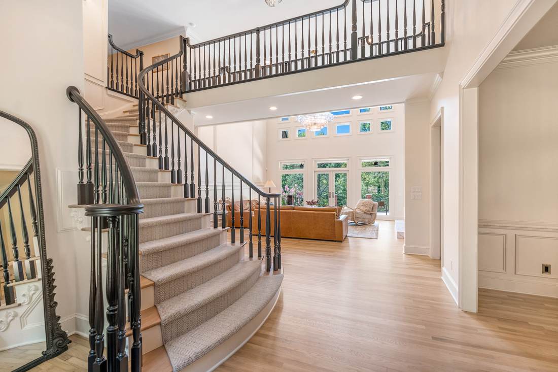 Two-story foyer, curved stair
