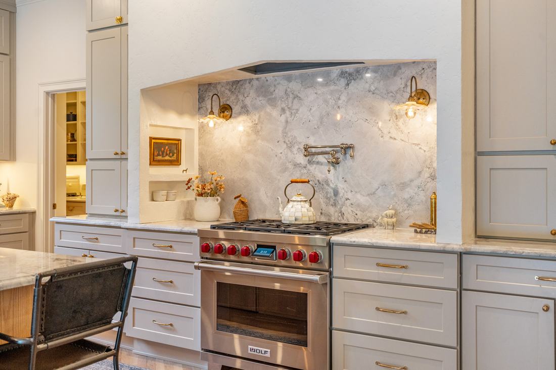 Wolf range beneath marble