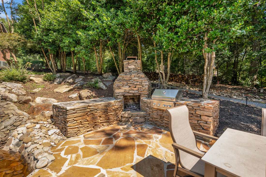 Outdoor fireplace and grilling terrace